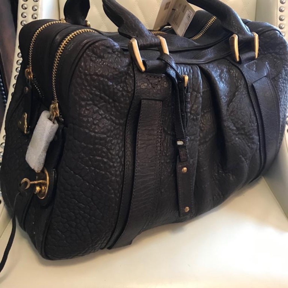 Brand new with tags, authentic Burberry handbag.
